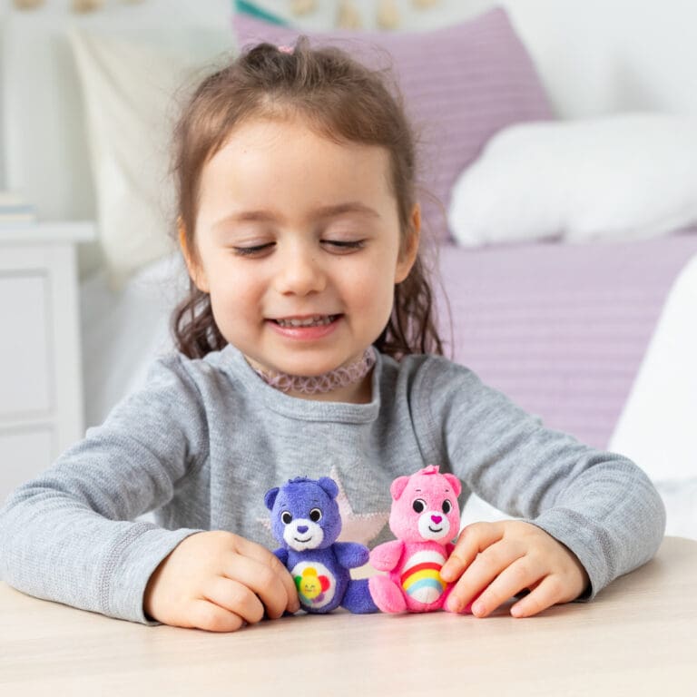 Girl With Care Bear Micro Plush